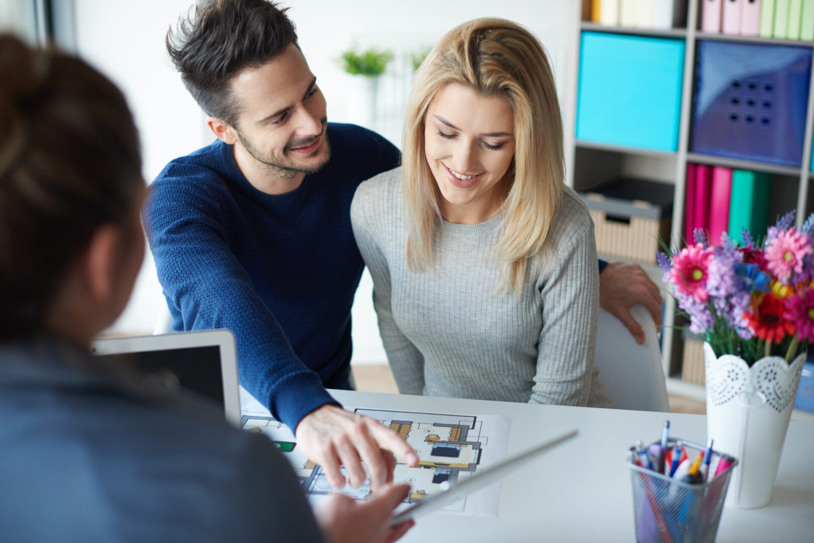 Female realtor showing necessary details